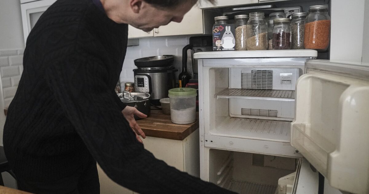Man lives sustainably by unplugging his refrigerator